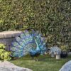 Alpine Corporation 23" Tall Outdoor Metallic Peacock Tail Spread Yard Statue, Vibrant Garden Sculpture for Patio, Lawn, or Entryway, Multicolor